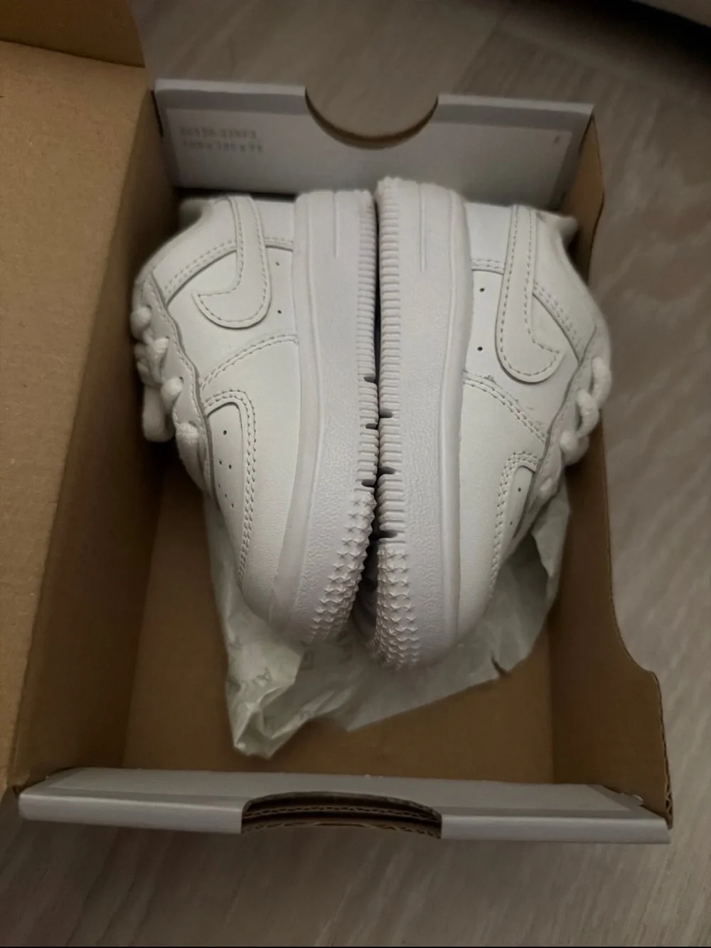 Nike Kids All-White Leather Sneakers